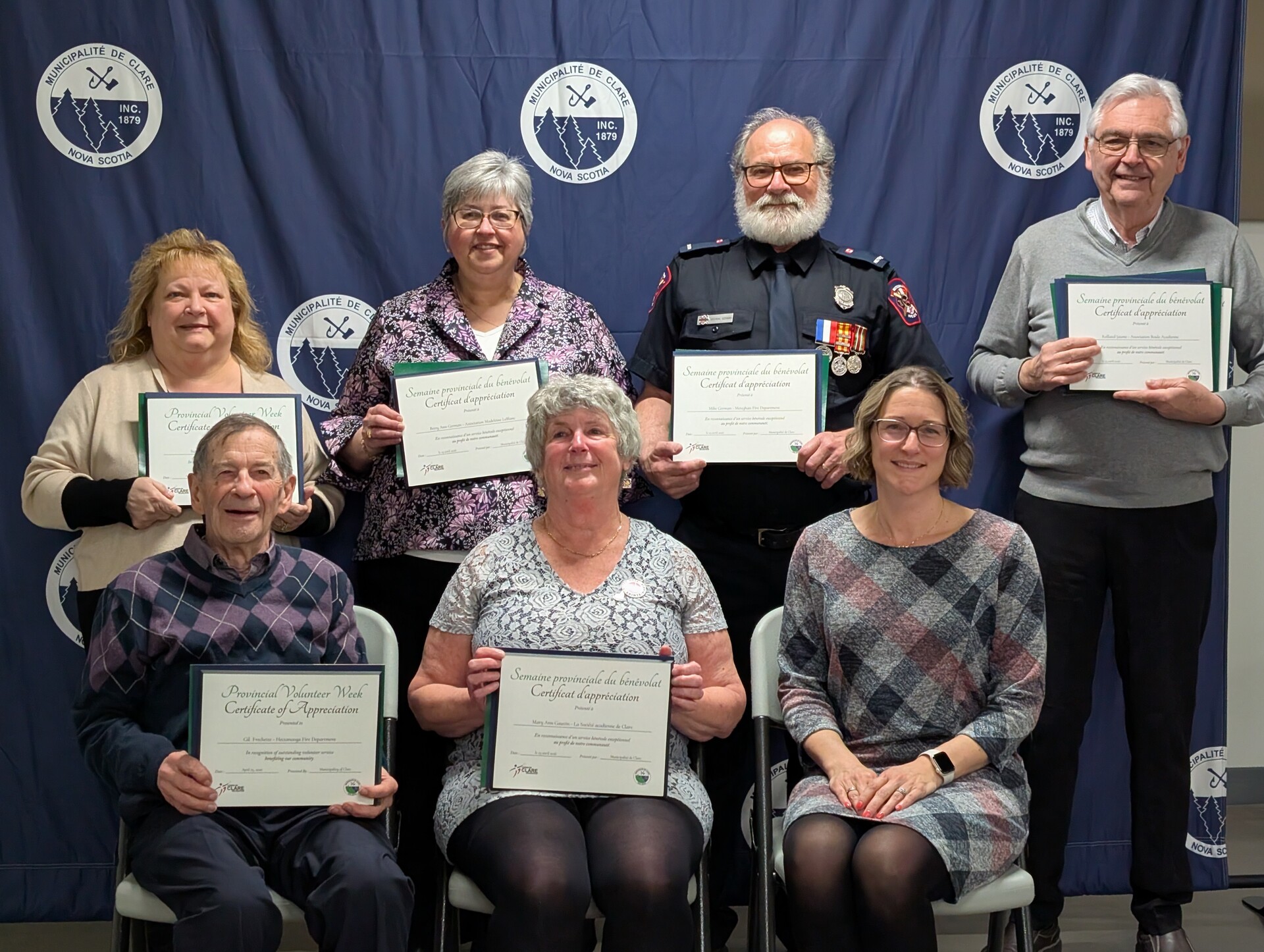 From left to right: Back row: Star Deveau, Betty Ann German, Mike German, Rolland Jaume. Front row: Gil Frechette, Mary Ann Gauvin, Councillor Nadine Comeau.