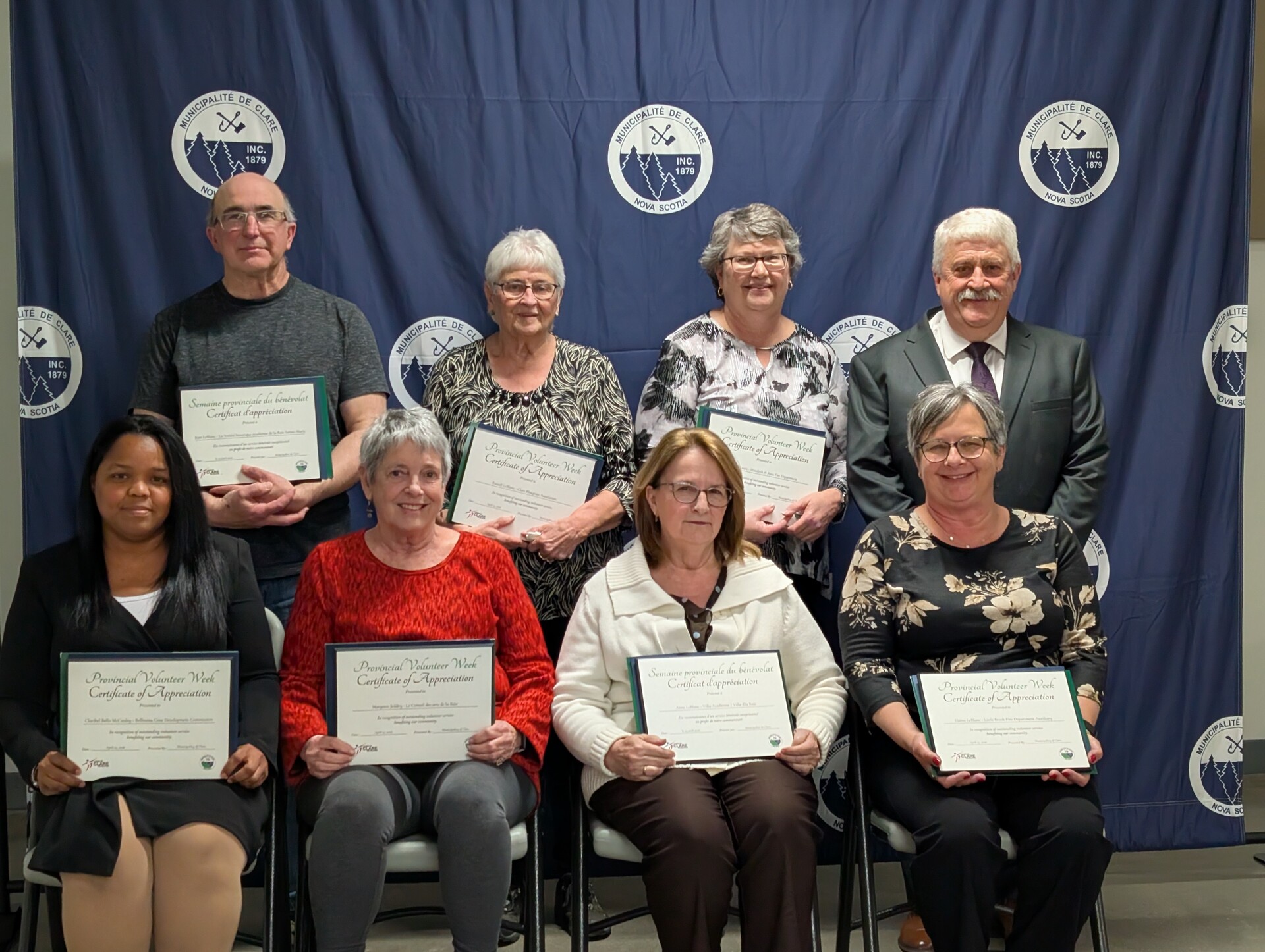 From left to right: Back row: Jean LeBlanc, Grace LeBlanc, Christine Lewis, Councillor Eric Pothier. Front row: Claribel Bello McCauley, Margaret Jeddry, Anne LeBlanc, Elaine LeBlanc.